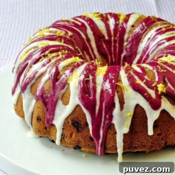 Lemon Blueberry Cream Cheese Pound Cake - A moist Bundt cake featuring bright lemon, sweet blueberries, and rich cream cheese.
