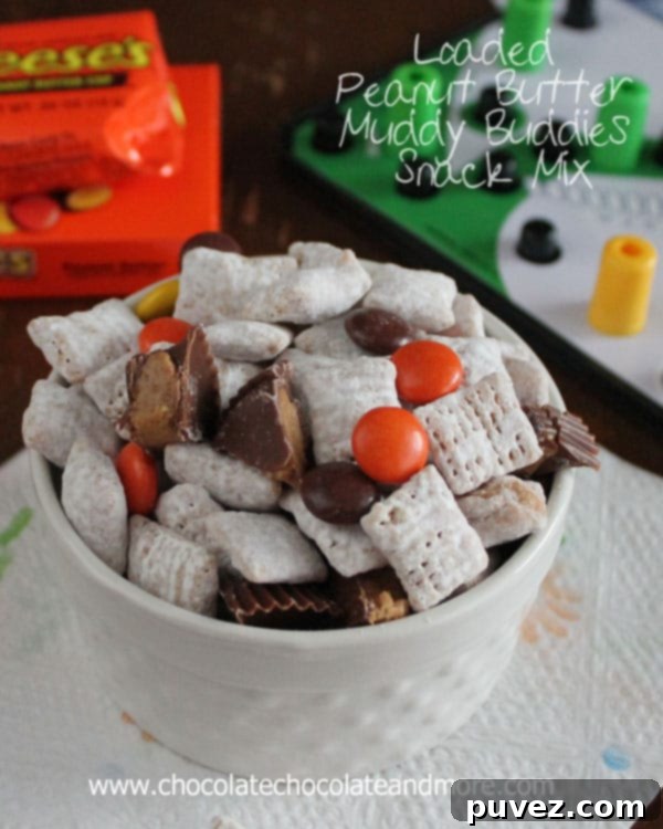 Overloaded Peanut Butter Puppy Chow Treat 2 Loaded Peanut Butter Muddy Buddies Snack Mix with Reese's Pieces and Peanut Butter Cups