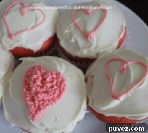 Delicious JELL-O infused Strawberries and Cream Cupcakes