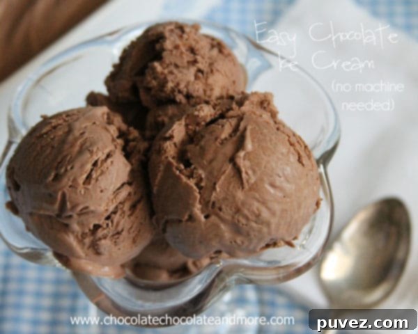 A scoop of homemade no-churn chocolate ice cream on a cone, ready to be eaten