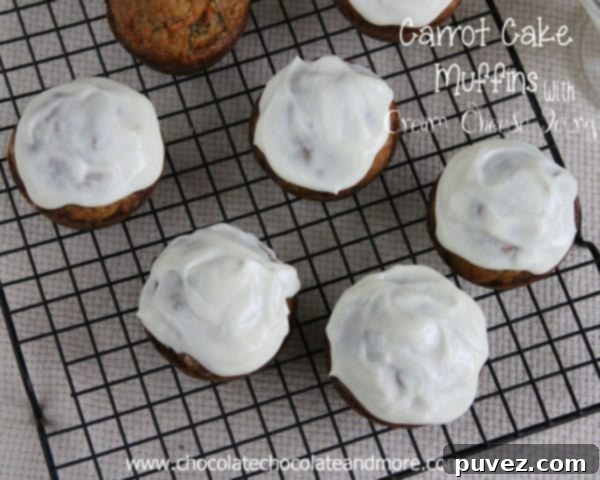 Another perspective of a frosted Carrot Cake Muffin, ready to be enjoyed.