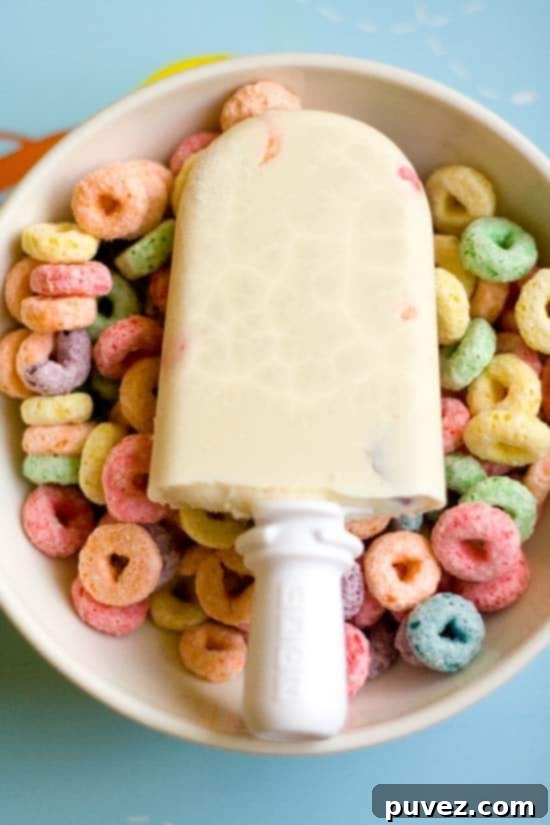 Nostalgic Cereal and Milk Popsicles, a unique frozen treat inspired by breakfast.