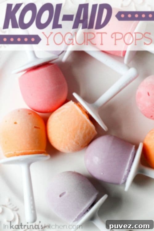 Colorful Kool-Aid Yogurt Pops, a fun and kid-friendly tangy frozen treat.