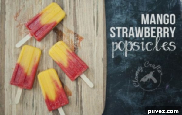 Vibrant Mango Strawberry Popsicles, a refreshing blend of tropical and classic fruit flavors.