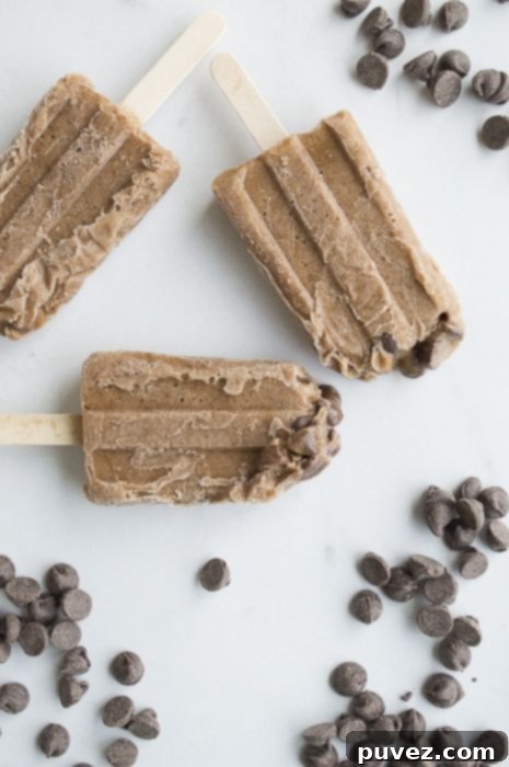 Creamy Mocha Banana Popsicles, an invigorating frozen treat combining coffee, chocolate, and fruit.