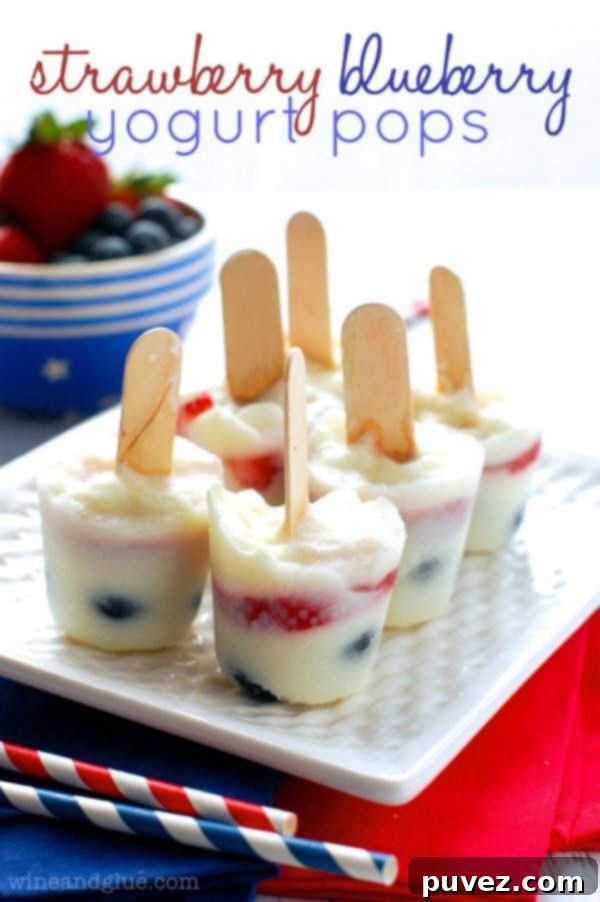 Healthy Strawberry Blueberry Yogurt Pops, a creamy, fruity, and beautifully colored frozen treat.