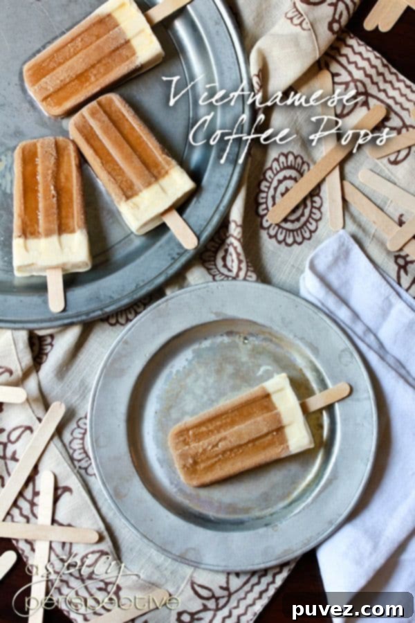 Exotic Vietnamese Coffee Popsicles, a rich and energizing frozen treat with bold coffee and condensed milk.