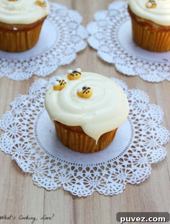 Honey Vanilla Cupcakes with a swirl of honey buttercream frosting.
