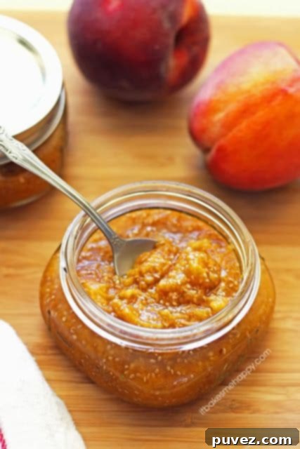 Jar of Homemade Honey Vanilla Peach Butter.