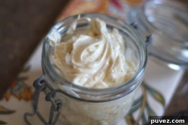 Vanilla Bean Whipped Honey Butter in a small glass dish.