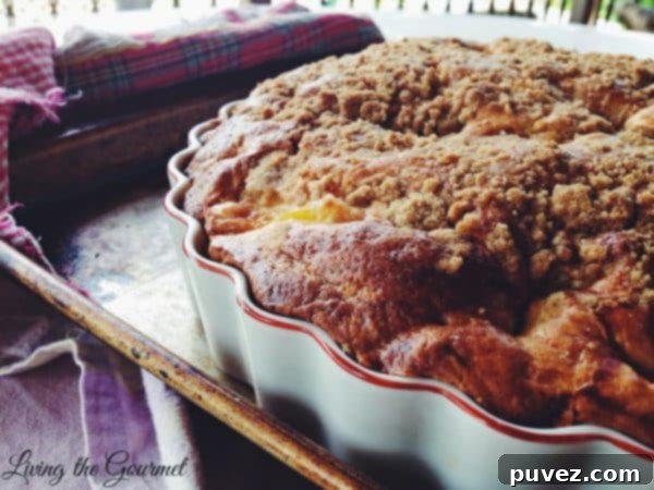 A slice of Vanilla Pineapple Cake with a light glaze.