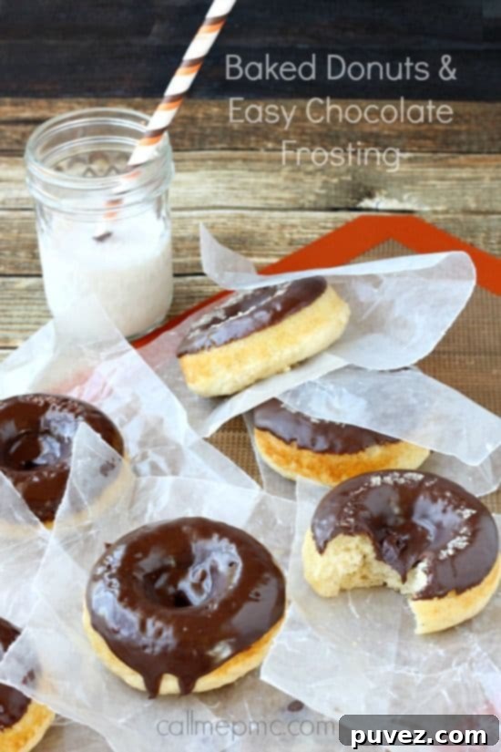 Baked Vanilla Donuts generously topped with chocolate frosting.
