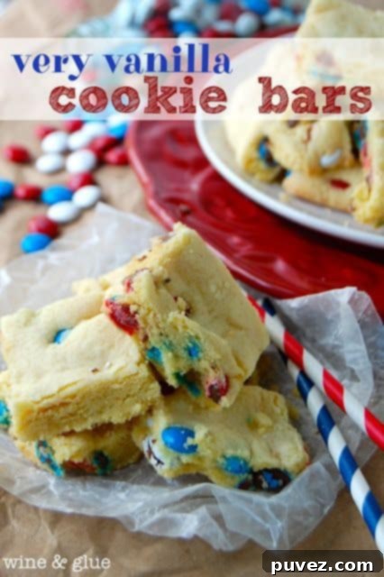Very Vanilla Cookie Bars cut into squares.