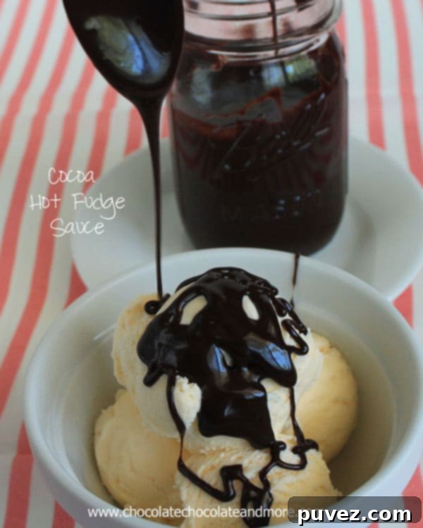 Warm, rich homemade cocoa hot fudge sauce drizzled over ice cream