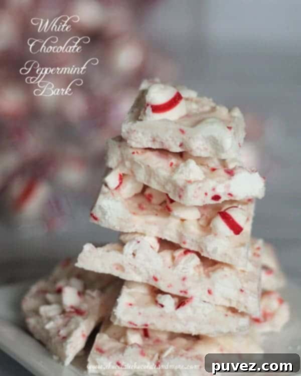 Delicious White Chocolate Peppermint Bark squares on a platter.