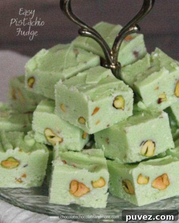 Rich and creamy Pistachio Fudge squares on a platter, ready to be served.