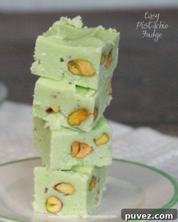 Pistachio Fudge cooling in a pan, showcasing its vibrant green color and smooth texture.