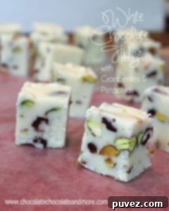 White Chocolate Fudge with Cranberries and Pistachios, a festive red and green treat.