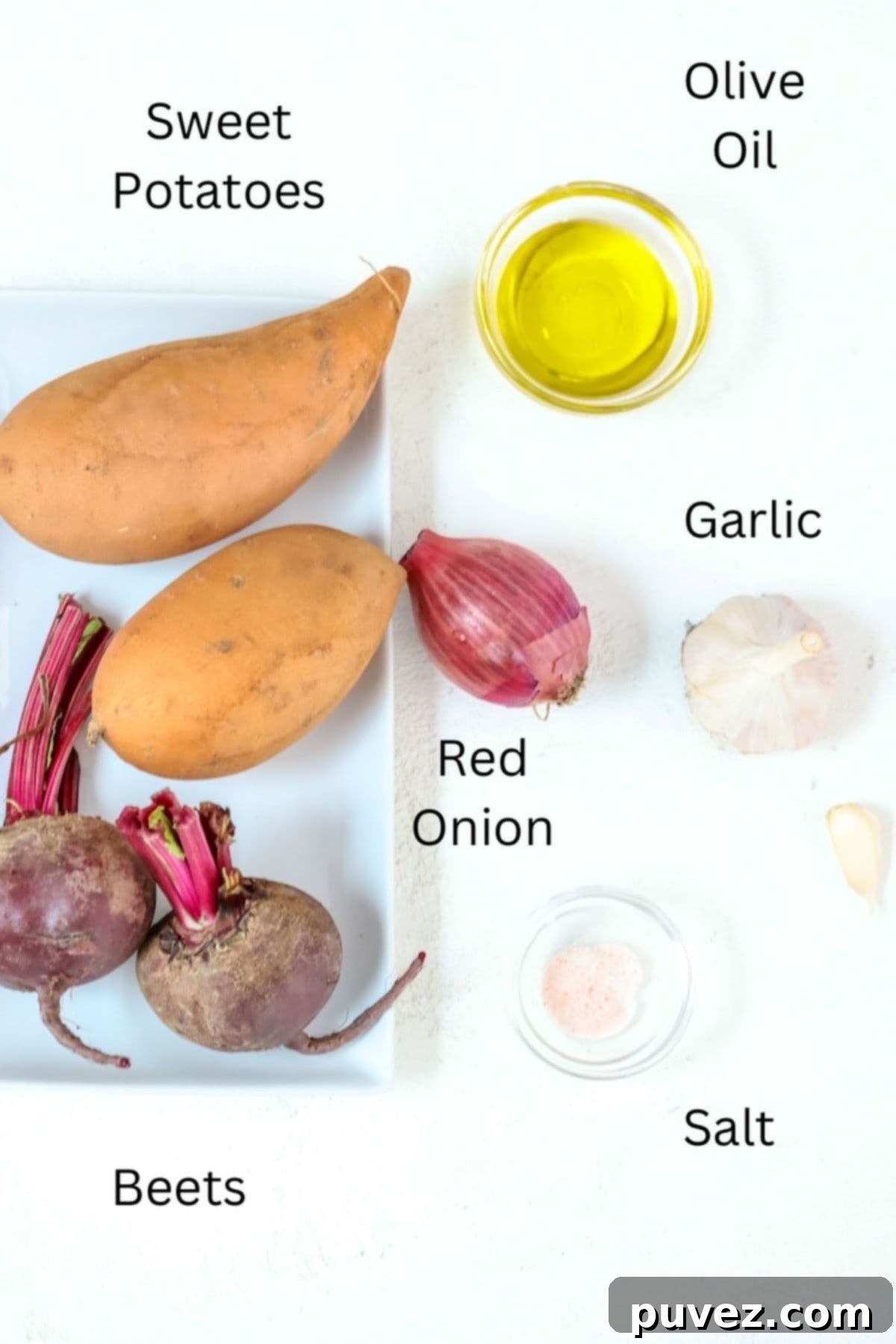 Labeled ingredients for roasted beets and sweet potatoes, including olive oil, salt, garlic, red onion, sweet potato, and beets.