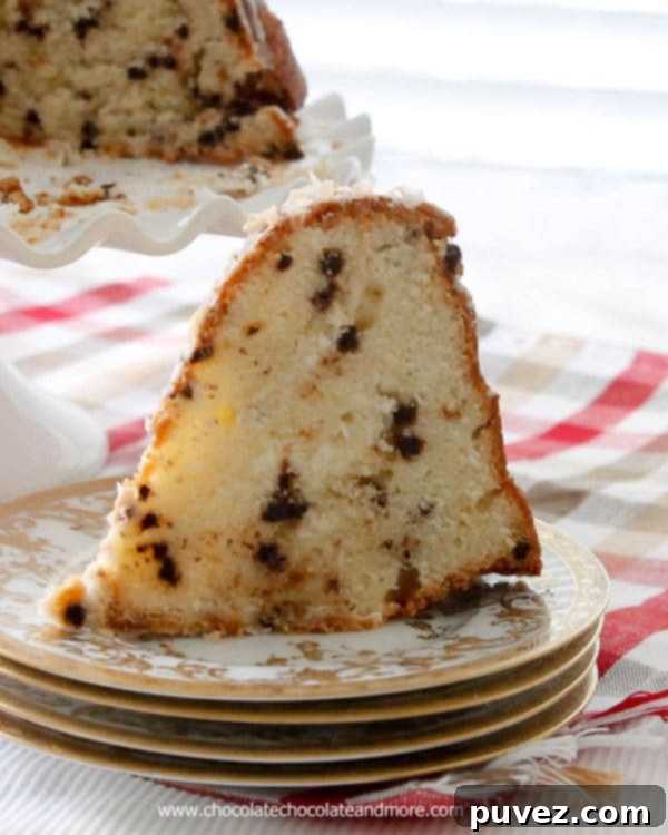 A slice of Chocolate Chip Coconut Bundt Cake, showcasing its moist texture and delicious inclusions