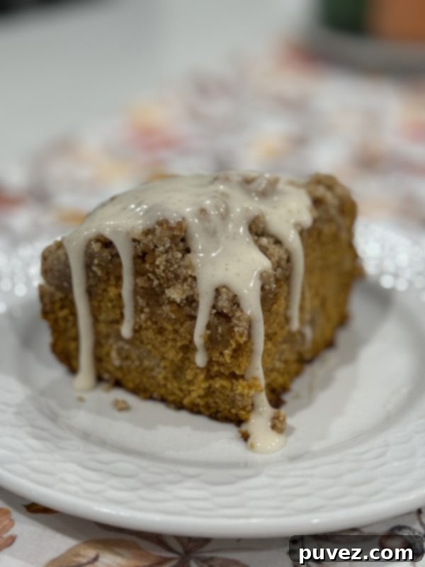 Glazed Pumpkin Coffee Cake slices with glaze drizzle